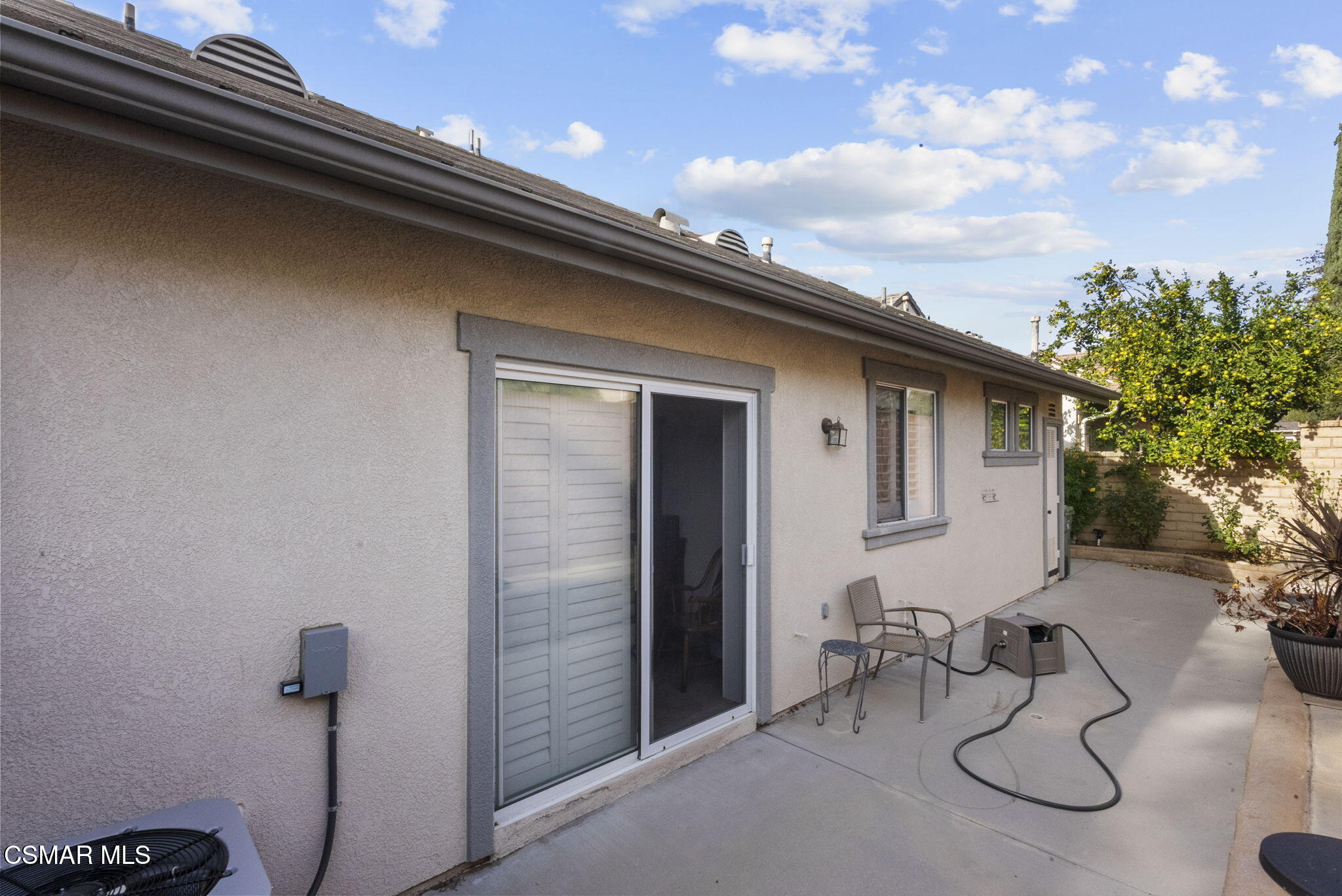 2046 Freesia Avenue Simi Valley, CA 93063 - Photo 29 of 33 a backyard of a house with table and chairs
