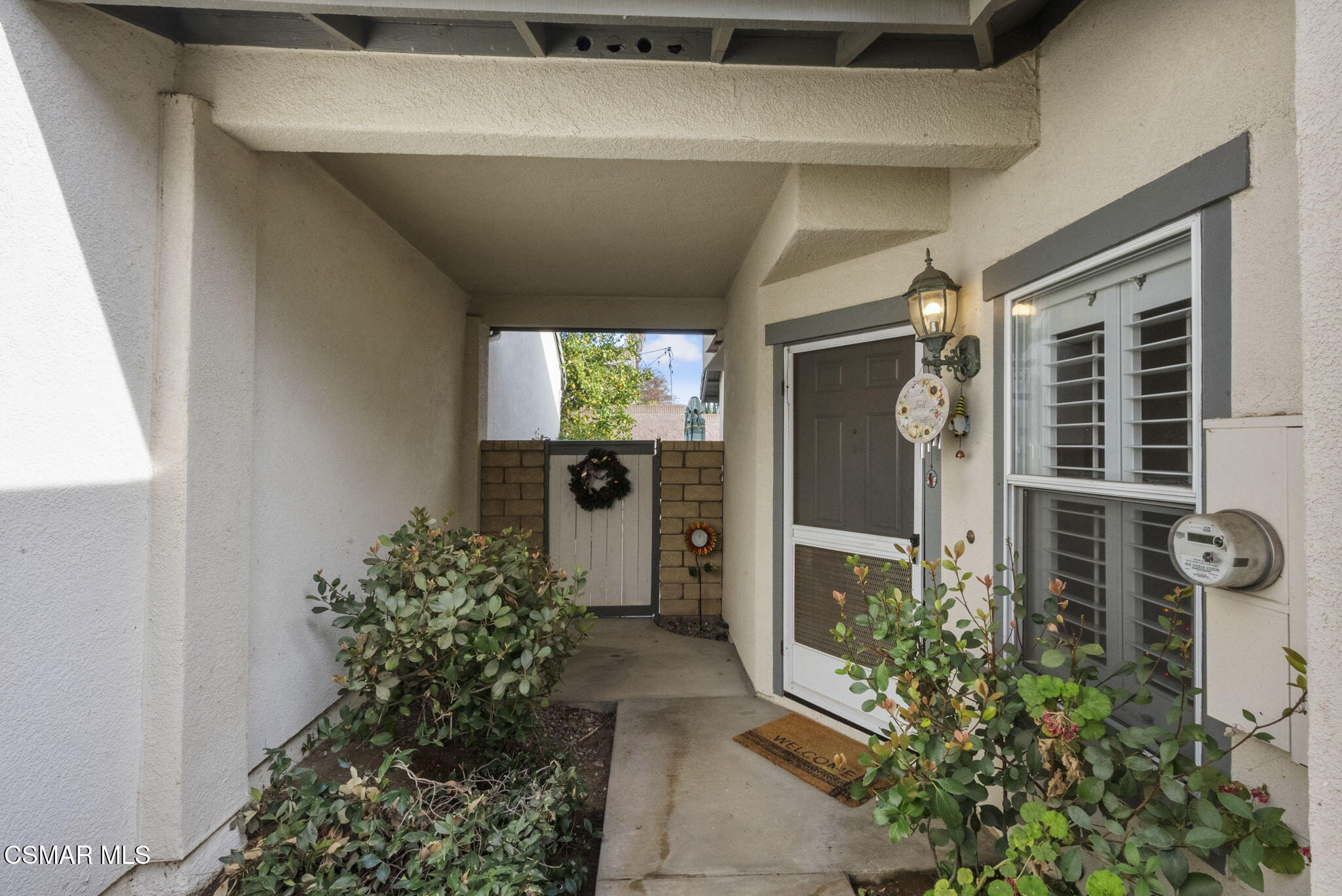 2046 Freesia Avenue Simi Valley, CA 93063 - Photo 5 of 33 a front view of a house with a yard