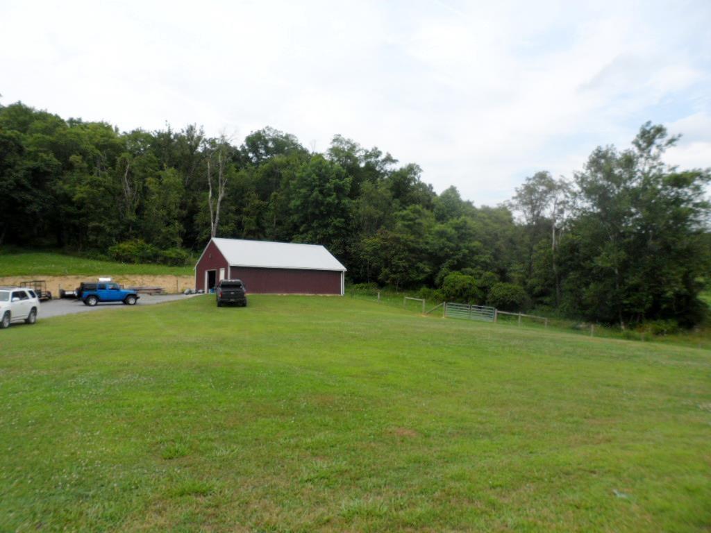 105 Steel Hill Road Mount Morris, PA 15349 - Photo 23 of 23 HEATED 28X40 POLE BARN WITH ADDITIONAL UPPER STORAGE.
