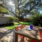 a view of a outdoor sitting area with furniture