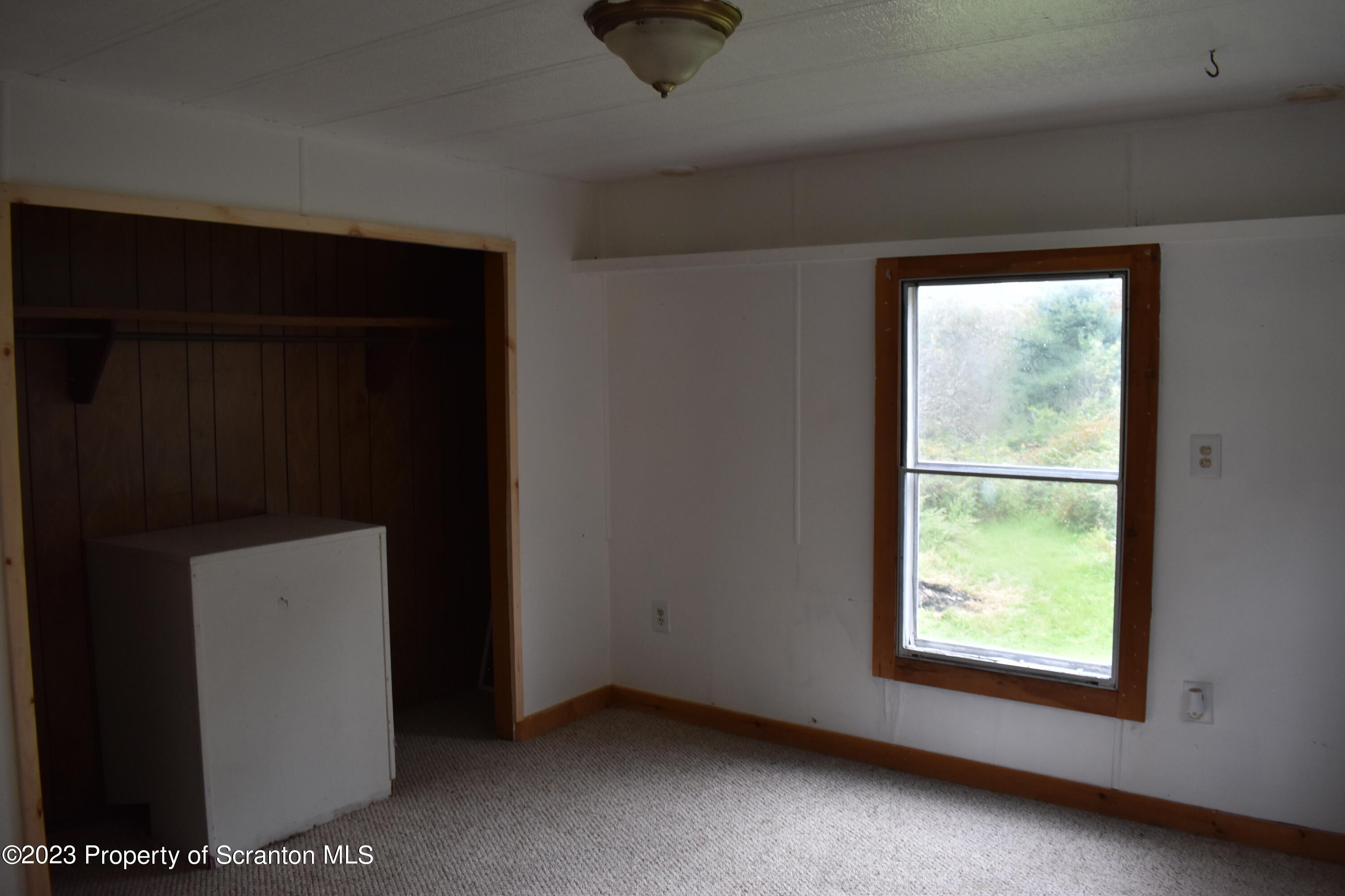 1258 Jennings Road Springville, PA 18844 - Photo 13 of 32 a view of an empty room with a window