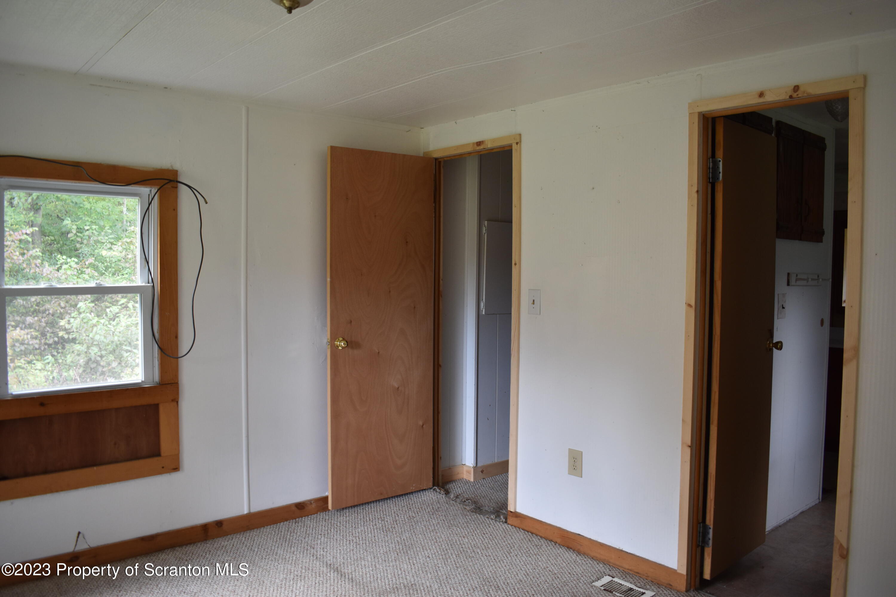 1258 Jennings Road Springville, PA 18844 - Photo 14 of 32 a view of an empty room and window