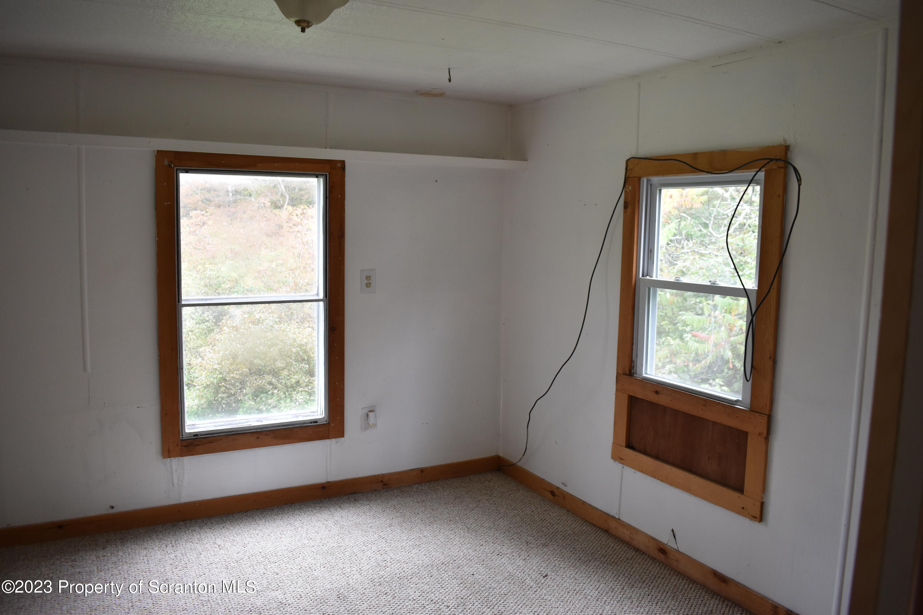 1258 Jennings Road Springville, PA 18844 - Photo 15 of 32 a view of an empty room with a window