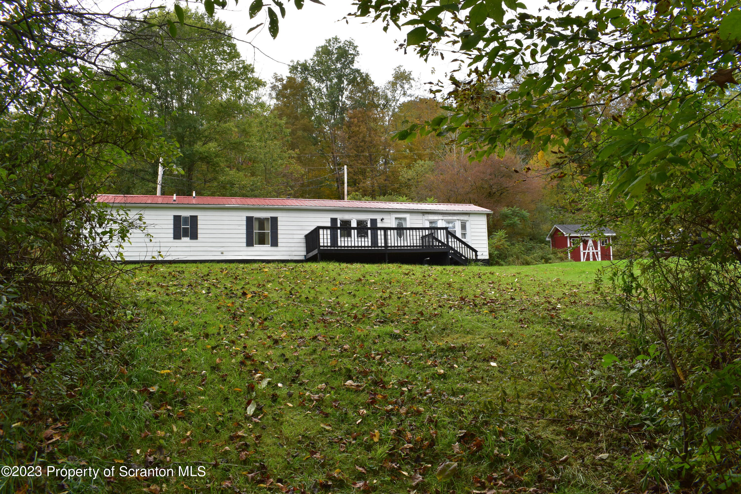 1258 Jennings Road Springville, PA 18844 - Photo 2 of 32 a view of a house with a big yard