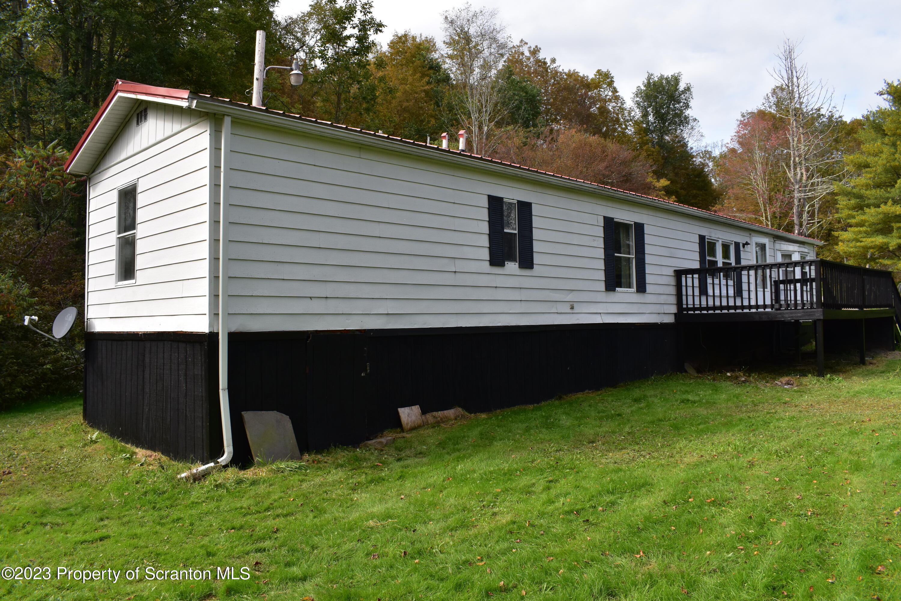 1258 Jennings Road Springville, PA 18844 - Photo 28 of 32 a view of a house with a yard