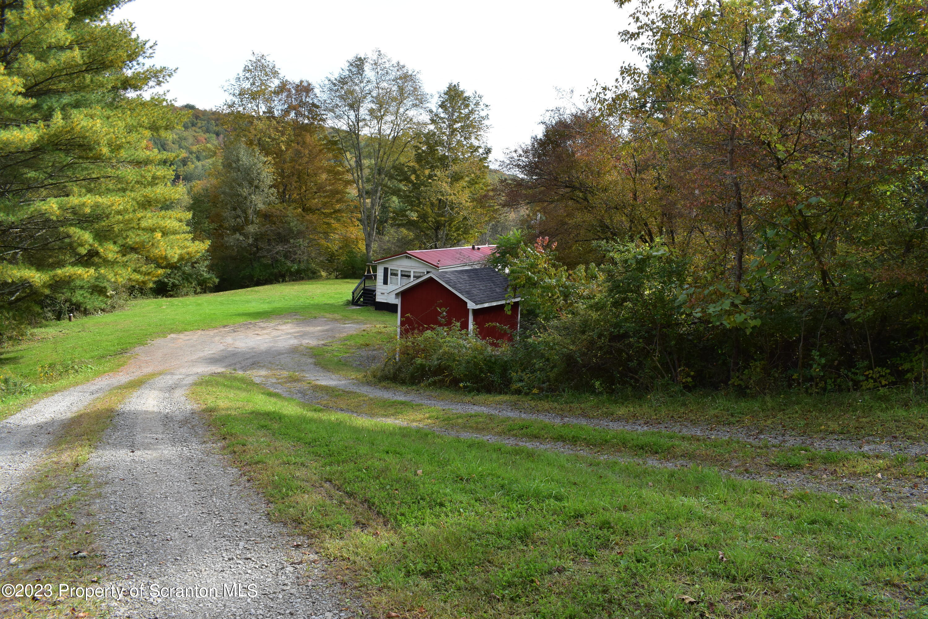 1258 Jennings Road Springville, PA 18844 - Photo 3 of 32 a backyard of a house with lots of green space