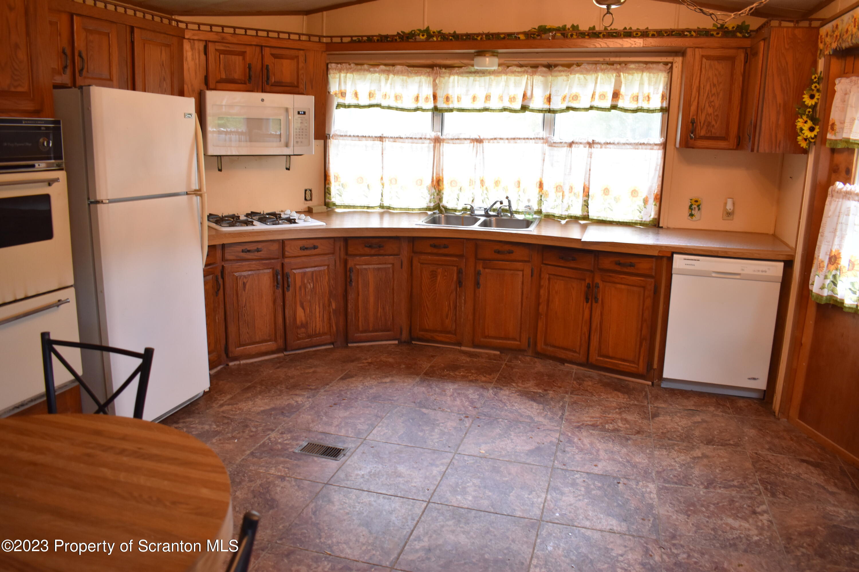 1258 Jennings Road Springville, PA 18844 - Photo 5 of 32 a view of a kitchen with a sink