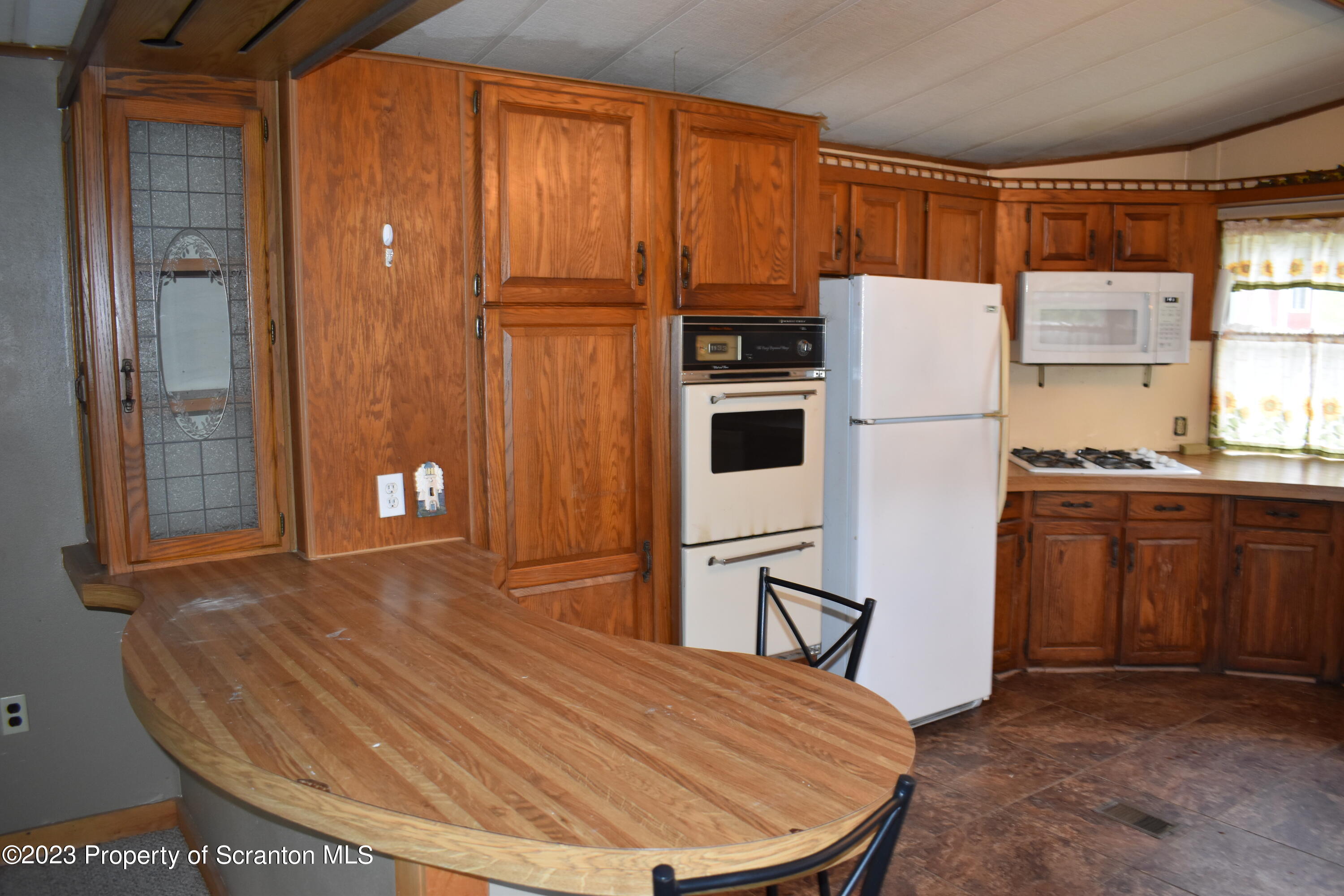 1258 Jennings Road Springville, PA 18844 - Photo 6 of 32 a view of kitchen with furniture and refrigerator