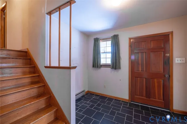 a view of entryway with a front door