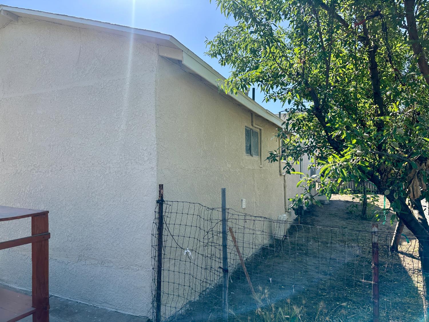 809 Washington Avenue Madera, CA 93638 - Photo 19 of 20 a view of a house with a tree