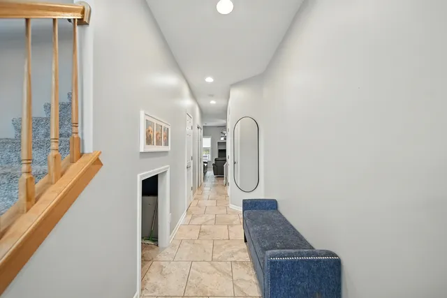 a living room with furniture and a table