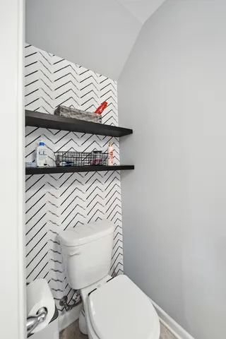 a view of a hallway with windows