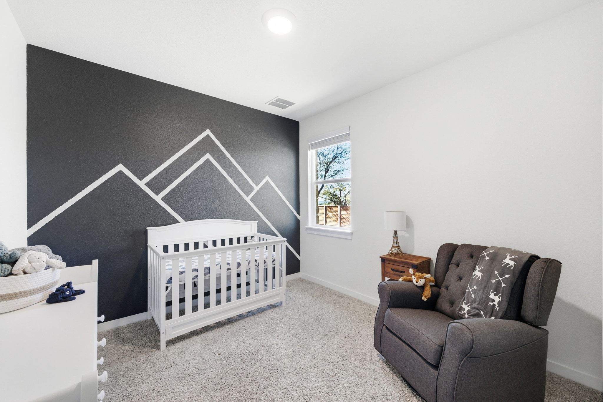 4420 Ingram Road Georgetown, TX 78628 - Photo 21 of 40 Bedroom with a nursery area and light colored carpet