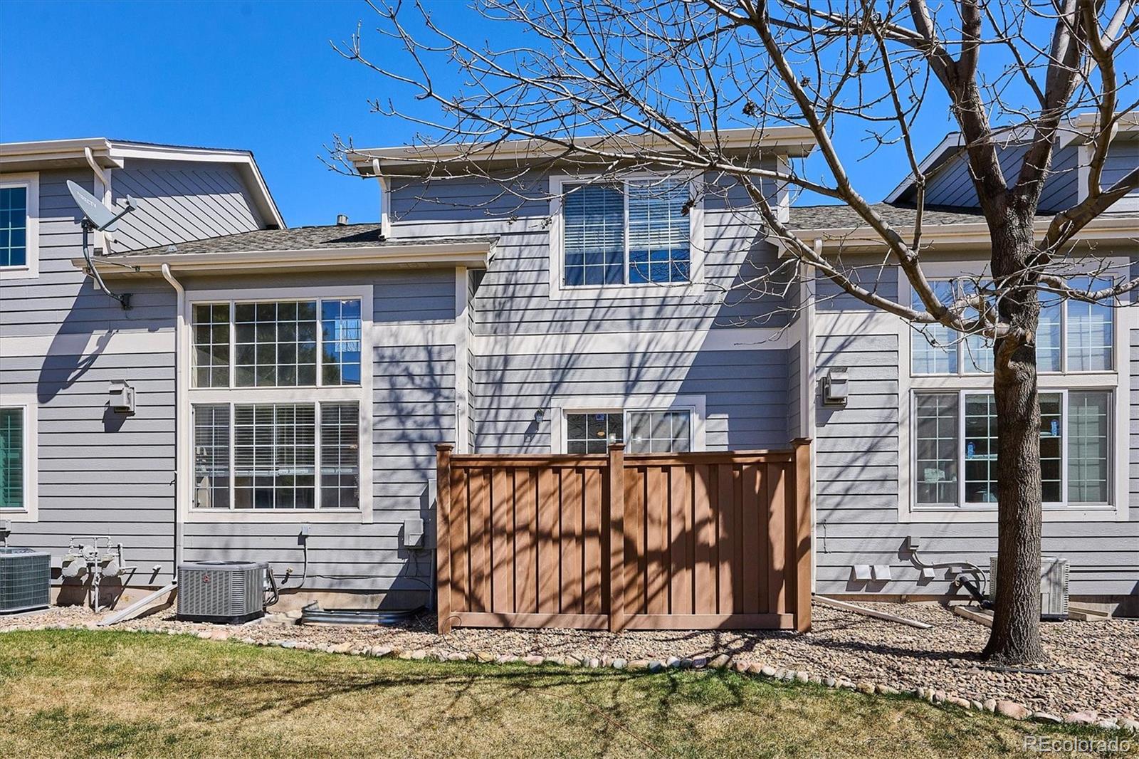 4545 South Taft Way Morrison, CO 80465 - Photo 19 of 19 a front view of a house with parking area