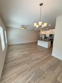a view of a room with a chandelier