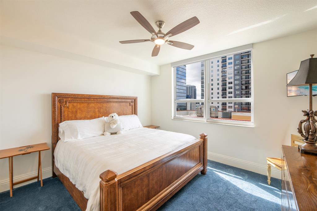 350 Southeast 2nd Street, Unit 1680 Fort Lauderdale, FL 33301 - Photo 17 of 35 a bed sitting in a bedroom next to a window