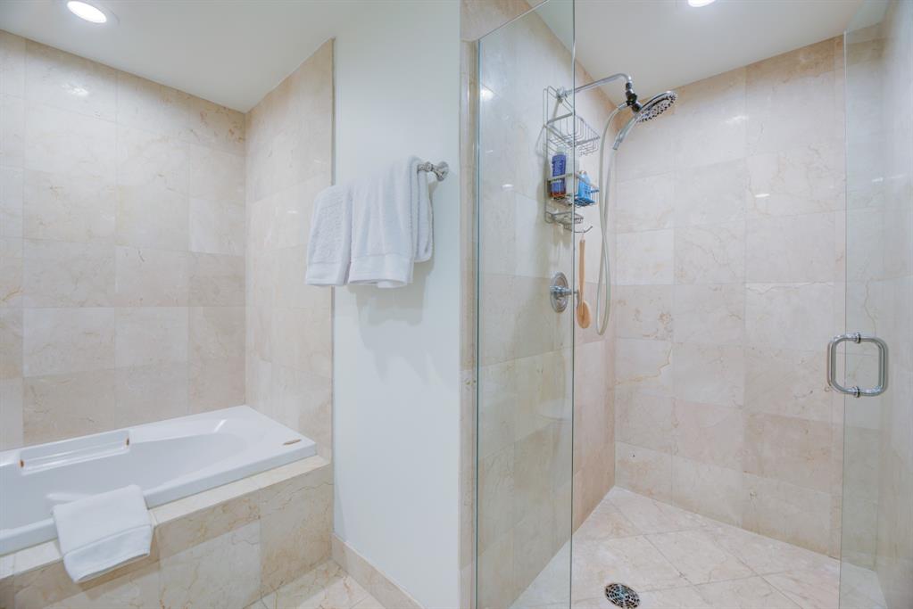 350 Southeast 2nd Street, Unit 1680 Fort Lauderdale, FL 33301 - Photo 21 of 35 a bathroom with a bathtub and shower