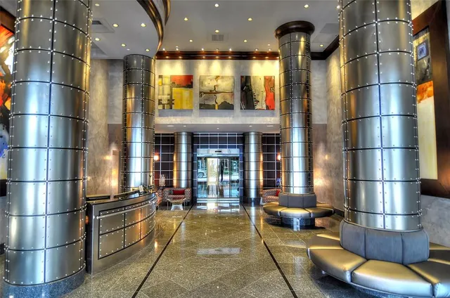 a view of a building with a couch and a garage