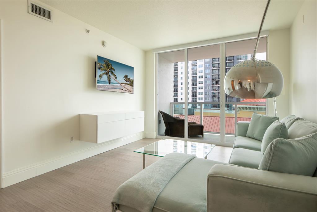 350 Southeast 2nd Street, Unit 1680 Fort Lauderdale, FL 33301 - Photo 6 of 35 a living room with furniture