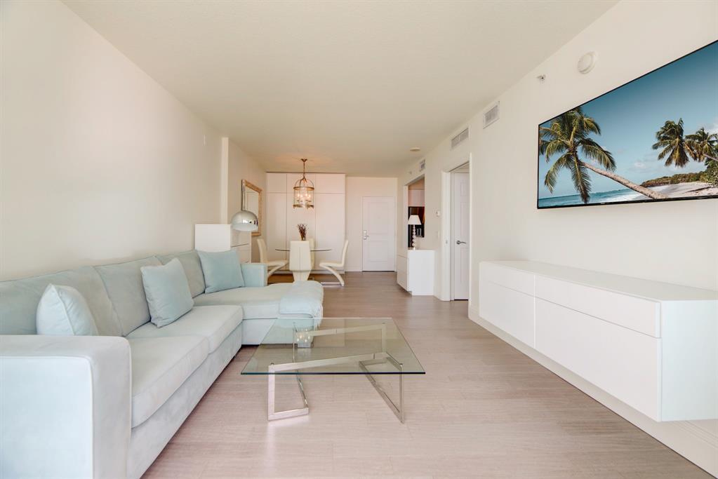 350 Southeast 2nd Street, Unit 1680 Fort Lauderdale, FL 33301 - Photo 7 of 35 a living room with furniture and a rug