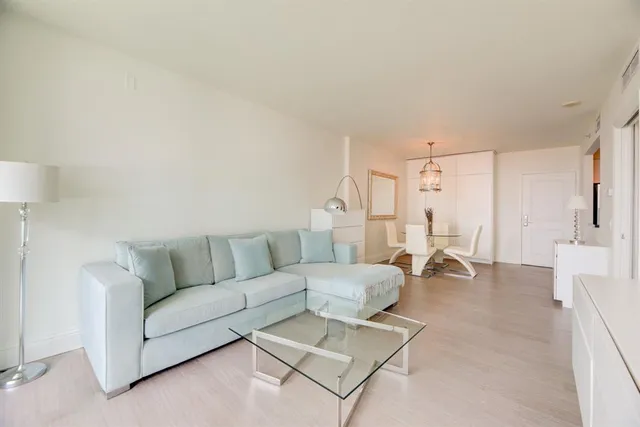 a living room with furniture and a couch