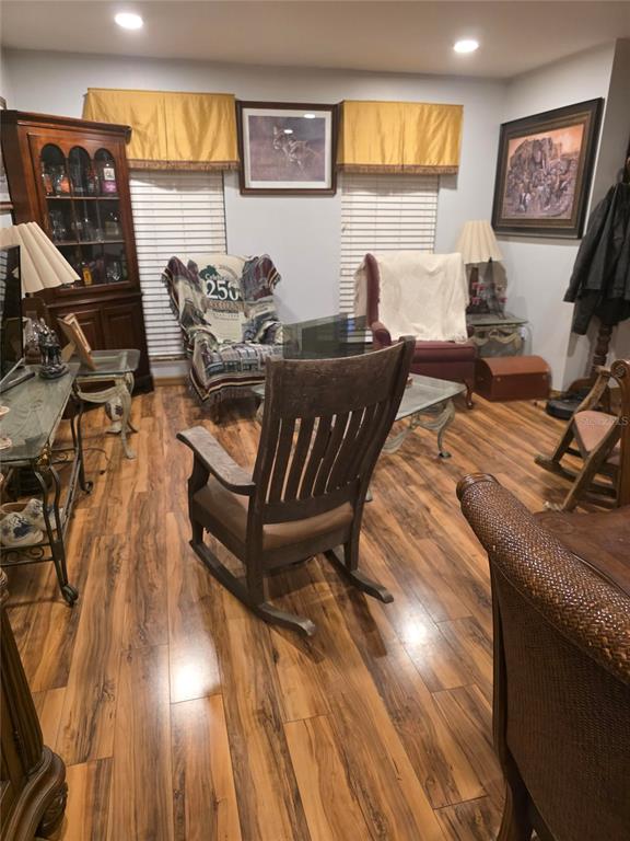 959 Thomas Road Eagle Lake, FL 33839 - Photo 26 of 35 a living room with furniture and a flat screen tv