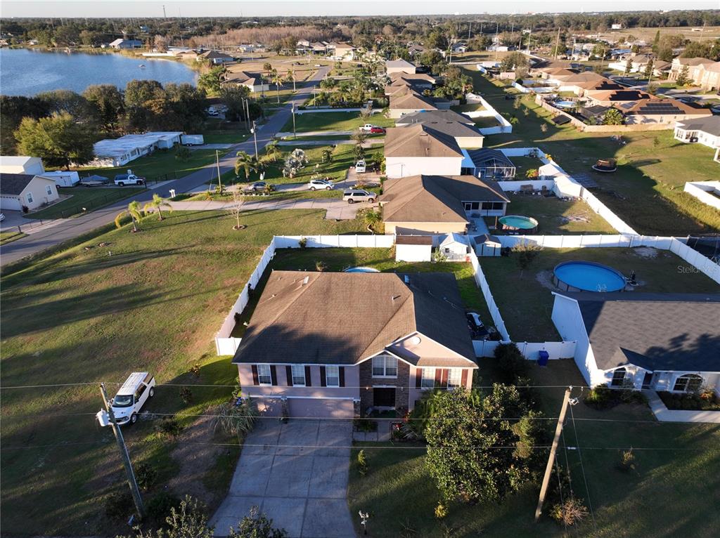959 Thomas Road Eagle Lake, FL 33839 - Photo 5 of 35 an aerial view of a house with a ocean view