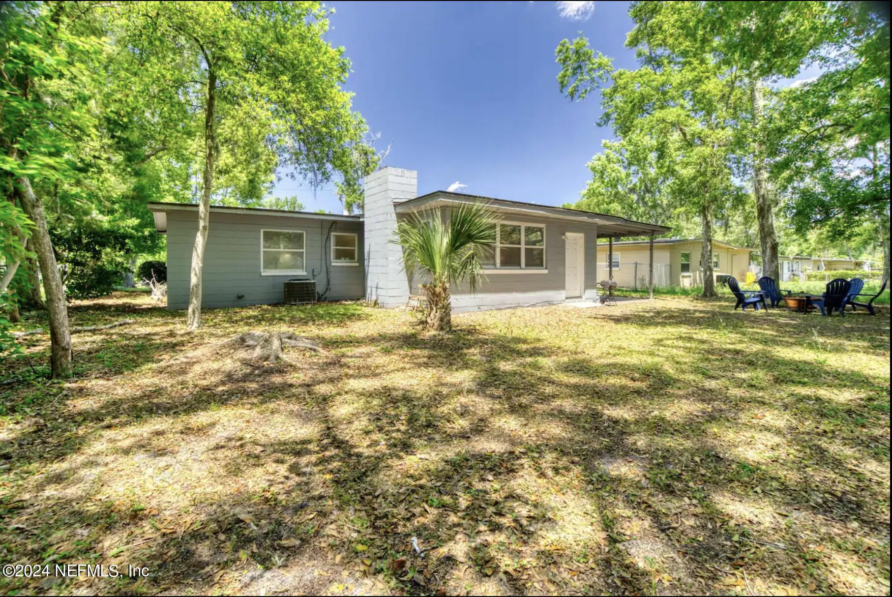 7466 Proxima Road Jacksonville, FL 32210 - Photo 29 of 34 a house view with a outdoor space