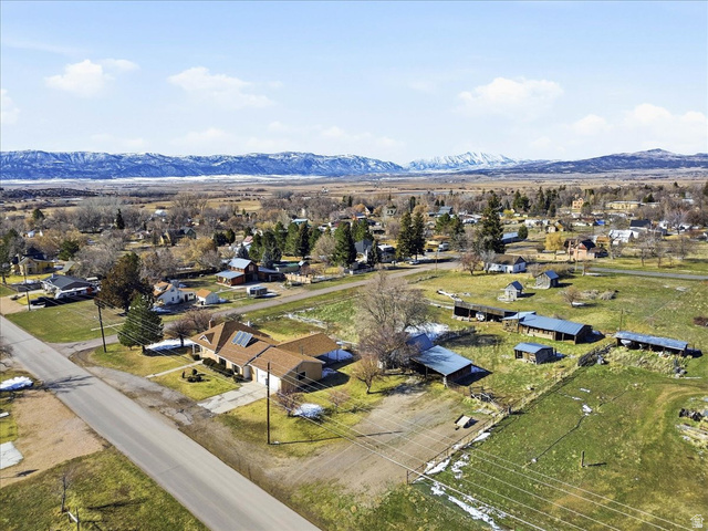 217 East 400 South Spring City, UT 84662 - Photo 58 of 71 Aerial view of residential area with a mountain backdrop