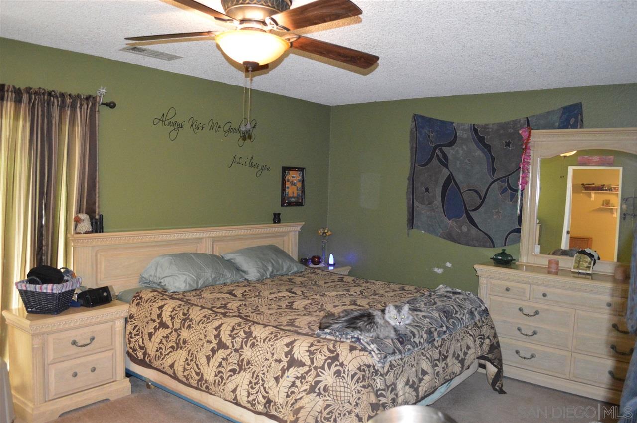 14915 Woods Valley Road Valley Center, CA 92082 - Photo 14 of 25 Master bedroom