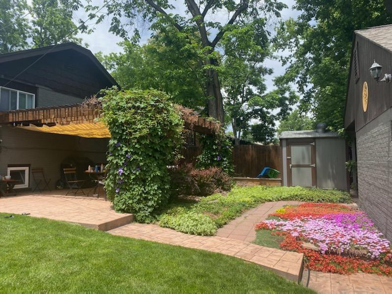 4140 Decatur Street Denver, CO 80211 - Photo 31 of 33 a view of a backyard with a garden