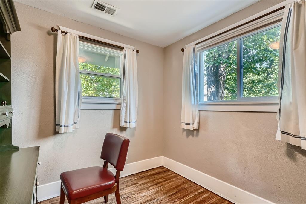 4140 Decatur Street Denver, CO 80211 - Photo 7 of 33 a view of a room with chair and wooden floor