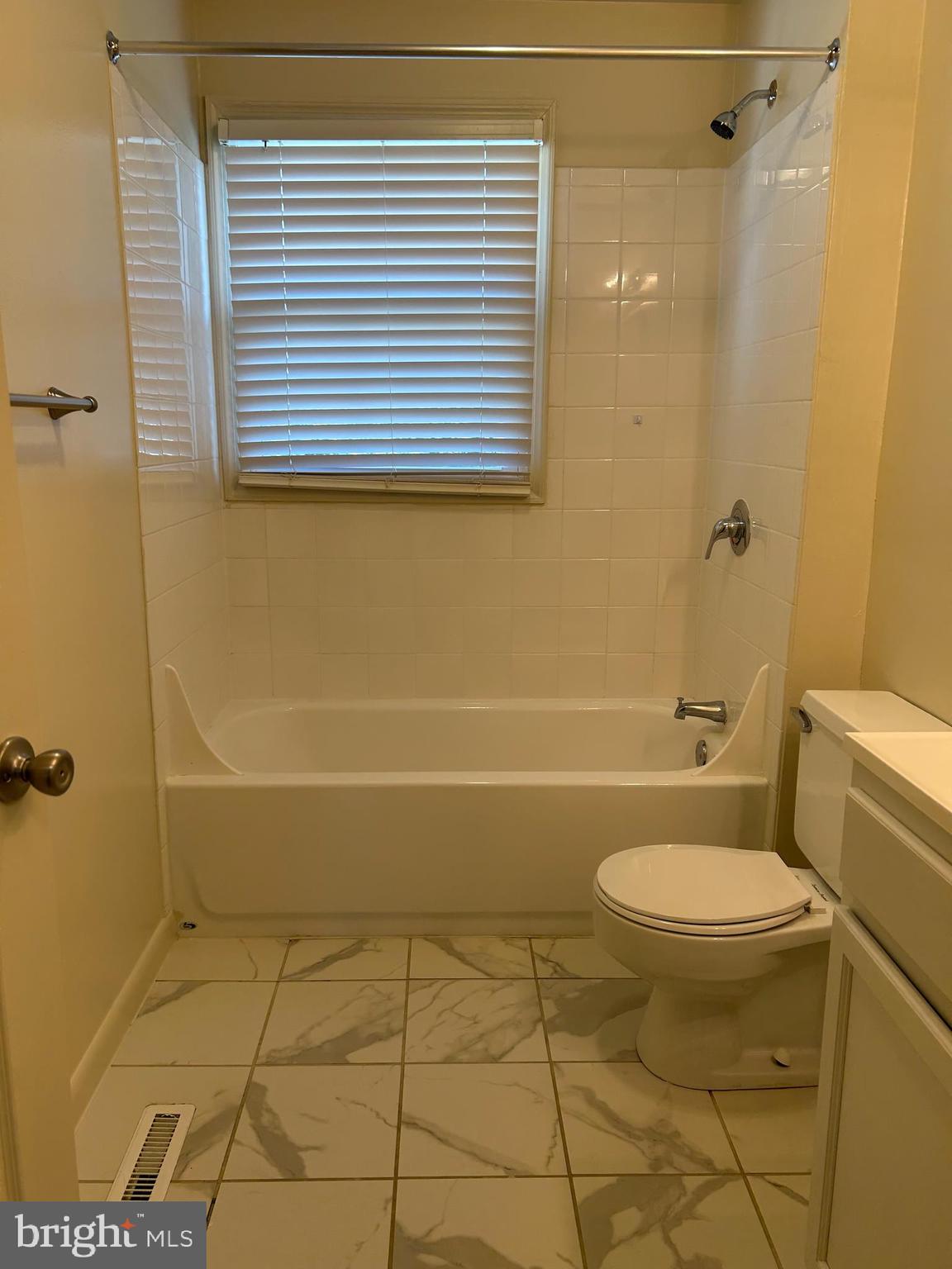 1600 Ruxton Road, Unit B4 Baltimore, MD 21204 - Photo 14 of 21 a bathroom with a toilet and a shower