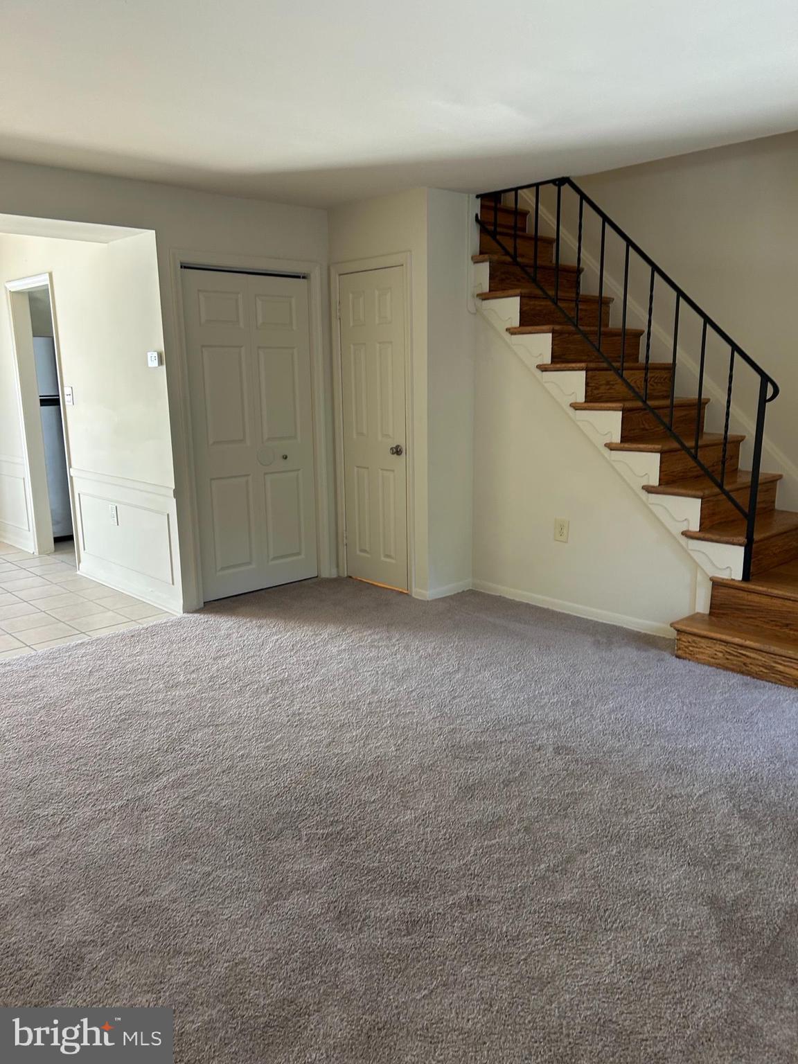 1600 Ruxton Road, Unit B4 Baltimore, MD 21204 - Photo 2 of 21 a view of an empty room with stairs