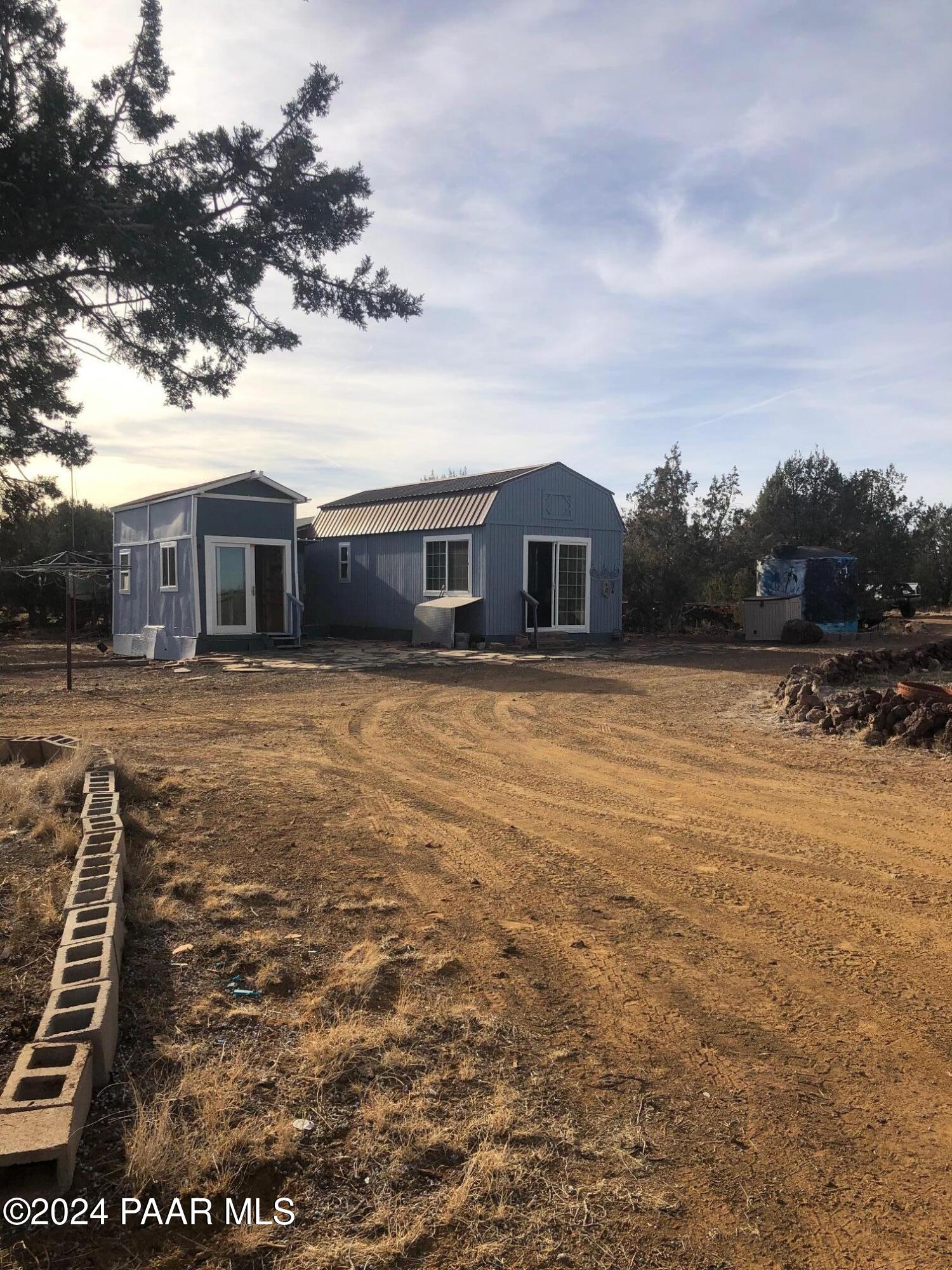 3669 Verde Road Williams, AZ 86046 - Photo 2 of 26 a view of a house with a yard
