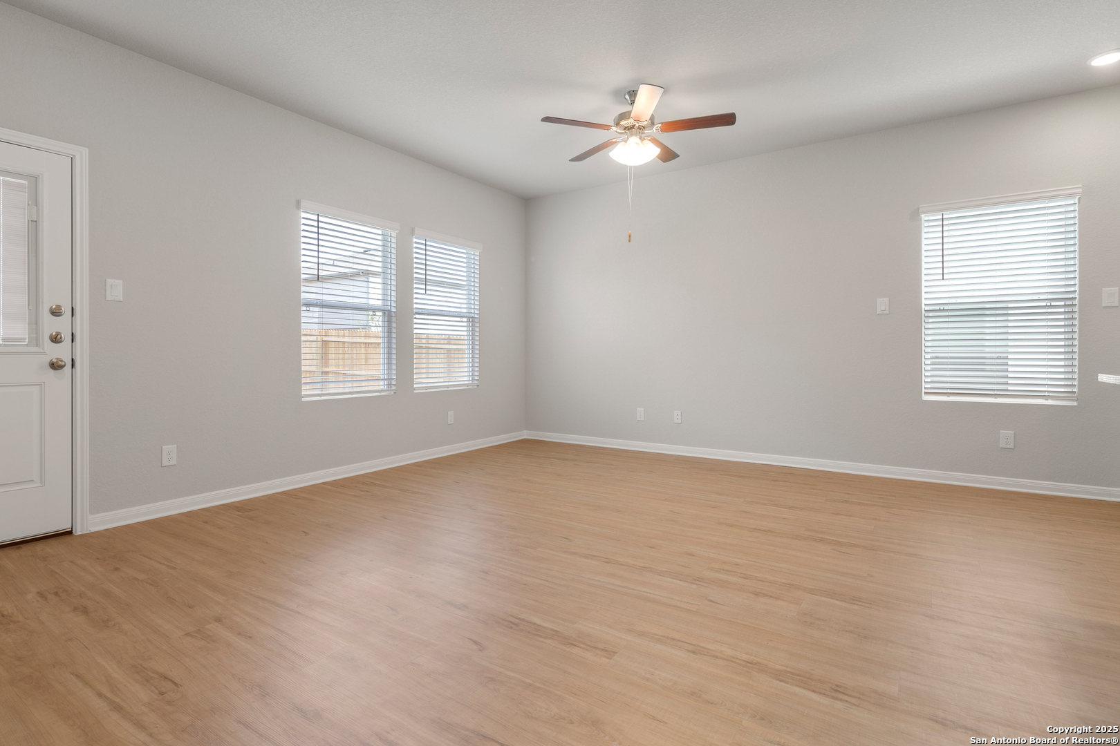 3924 Abbott Pass, Unit 101 St. Hedwig, TX 78152 - Photo 5 of 17 a view of an empty room with a window