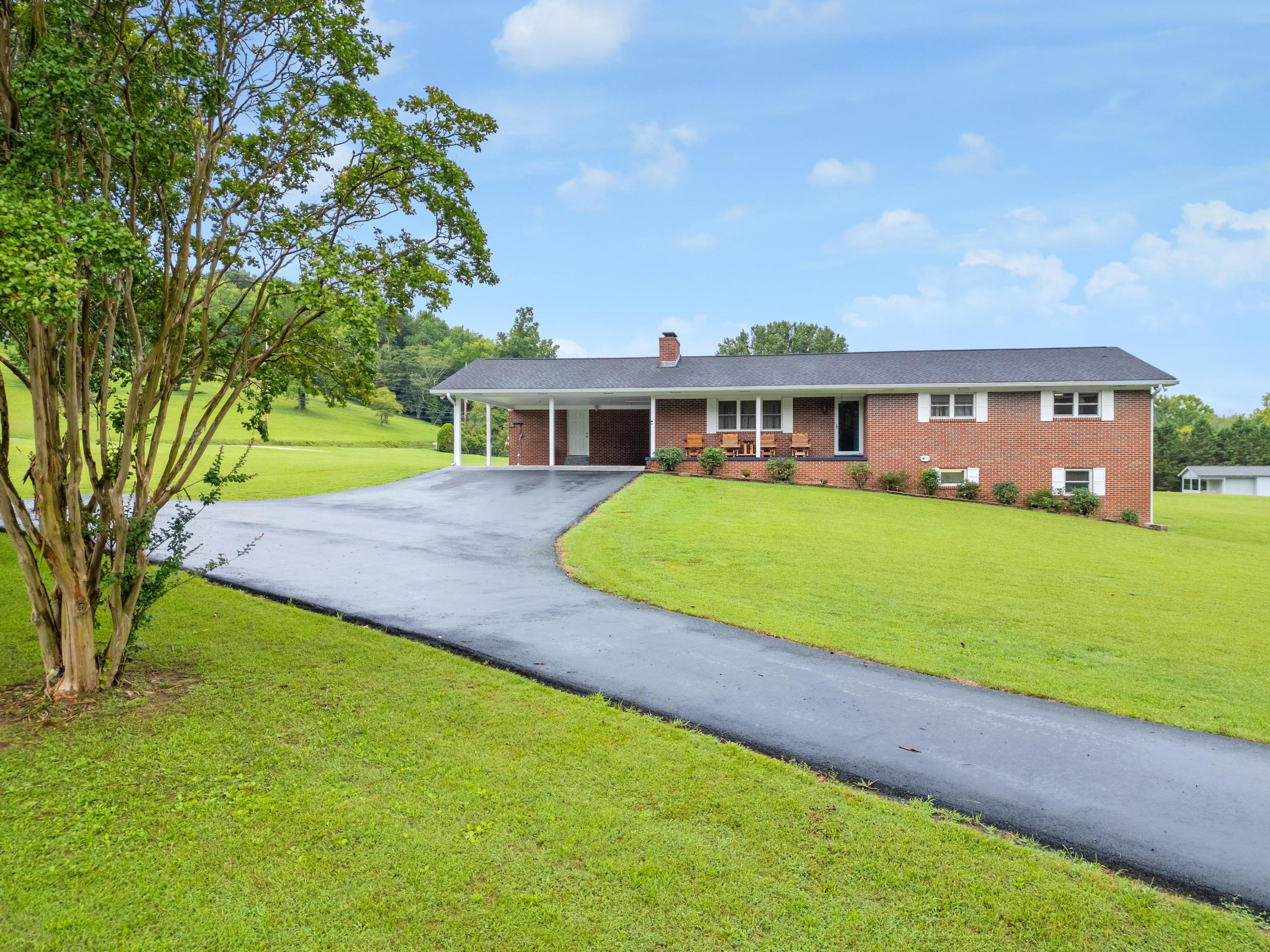 10219 Miller Road Soddy Daisy, TN 37379 - Photo 3 of 35 2024_07_July_10219_Miller_Rd_0015