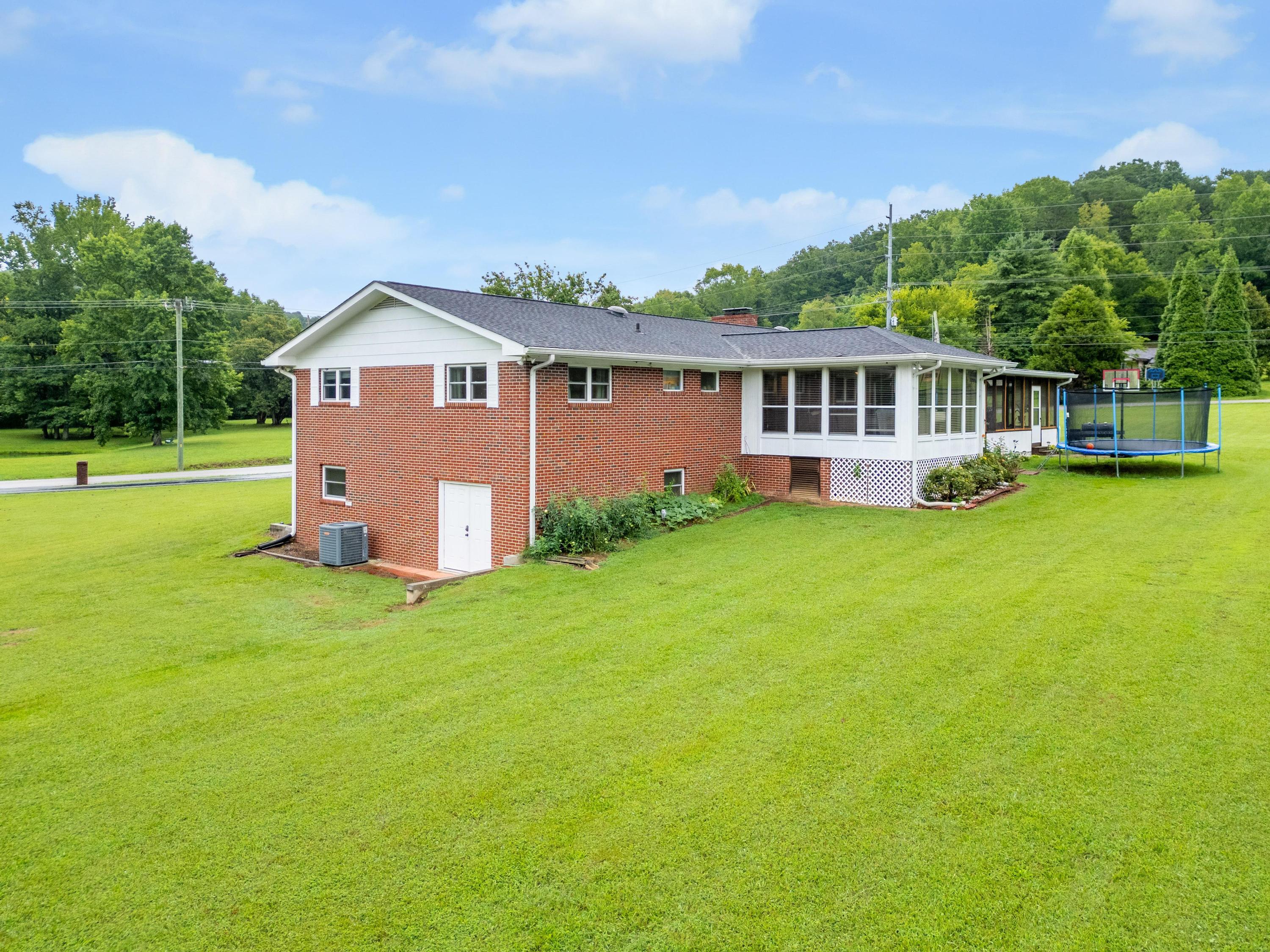 10219 Miller Road Soddy Daisy, TN 37379 - Photo 5 of 35 2024_07_July_10219_Miller_Rd_0004