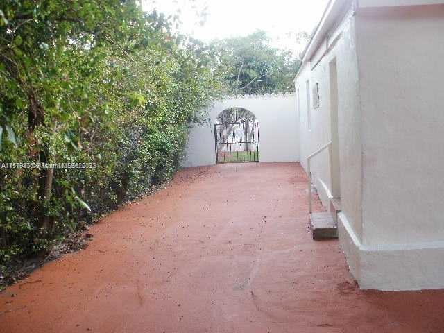 4001 Northwest 3rd Street Miami, FL 33126 - Photo 3 of 17 a view of a small space in front of a house