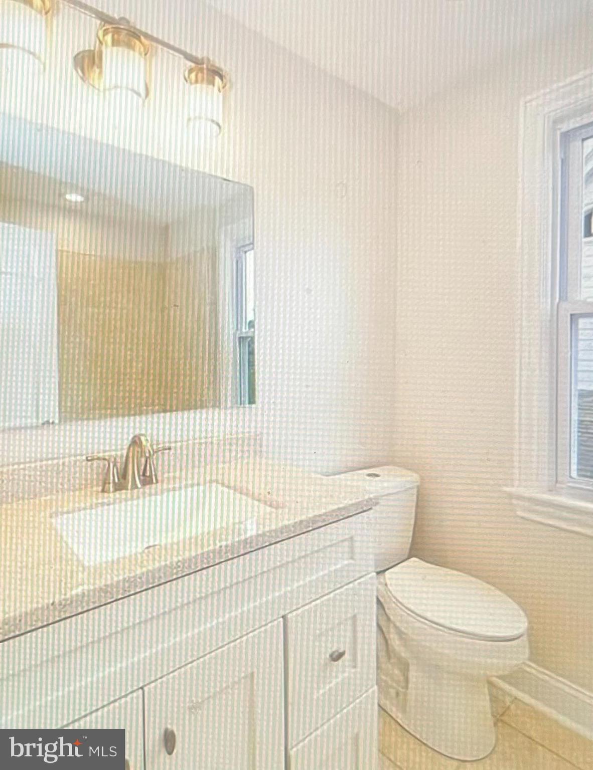 4001 State Road Upper Darby, PA 19026 - Photo 9 of 9 a bathroom with a sink a toilet and tub