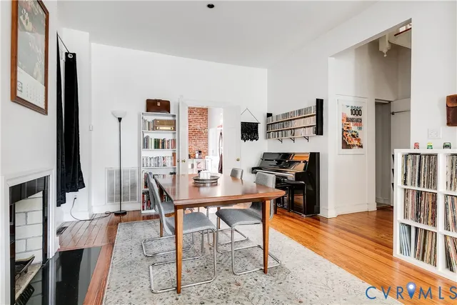 a view of a workspace with furniture and a living room