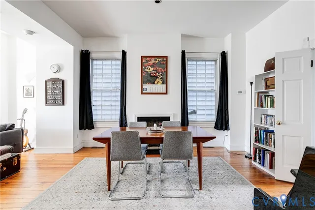 a work room with furniture and book shelf