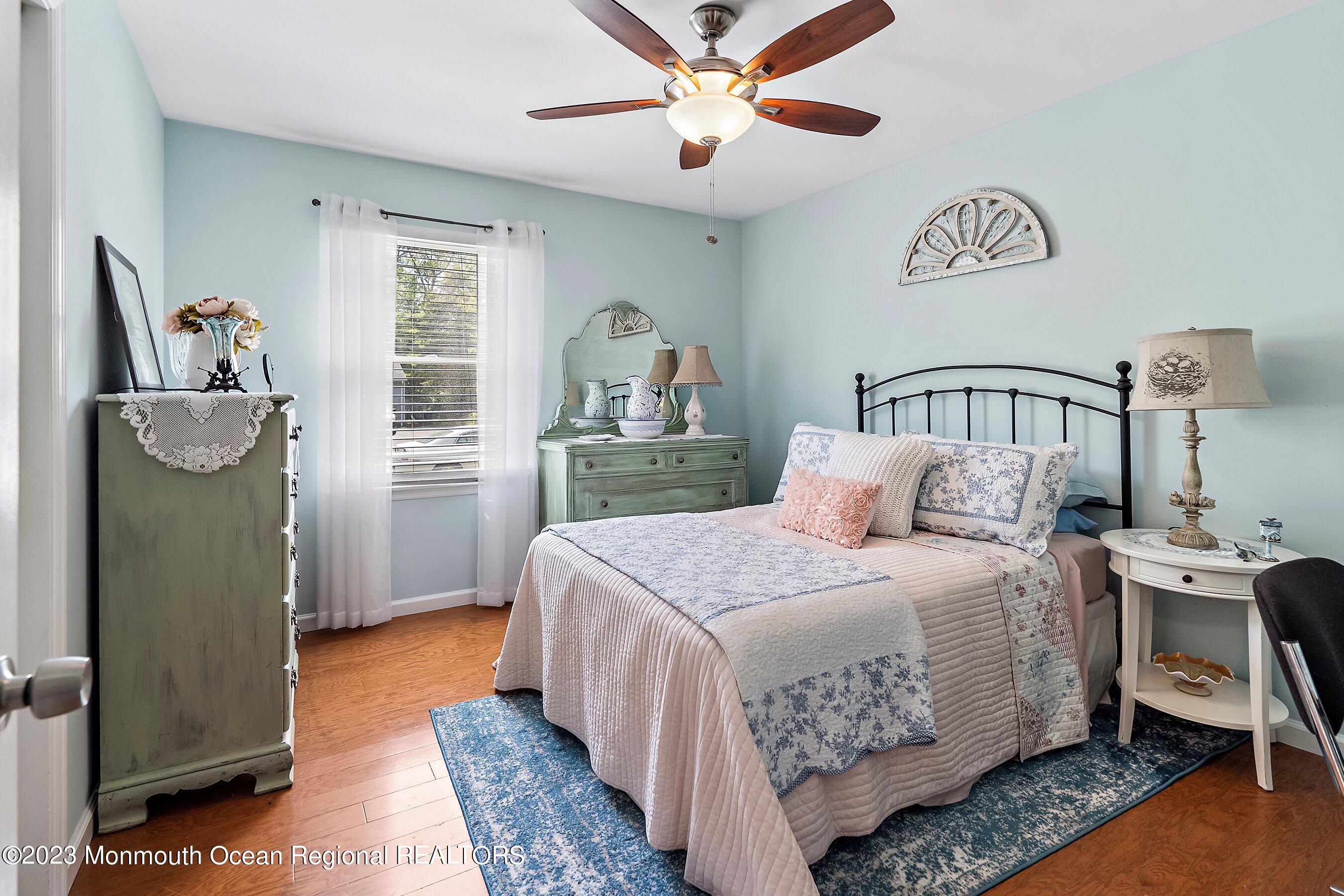 370 Constitution Drive Forked River, NJ 08731 - Photo 16 of 25 a bedroom with a bed and a window