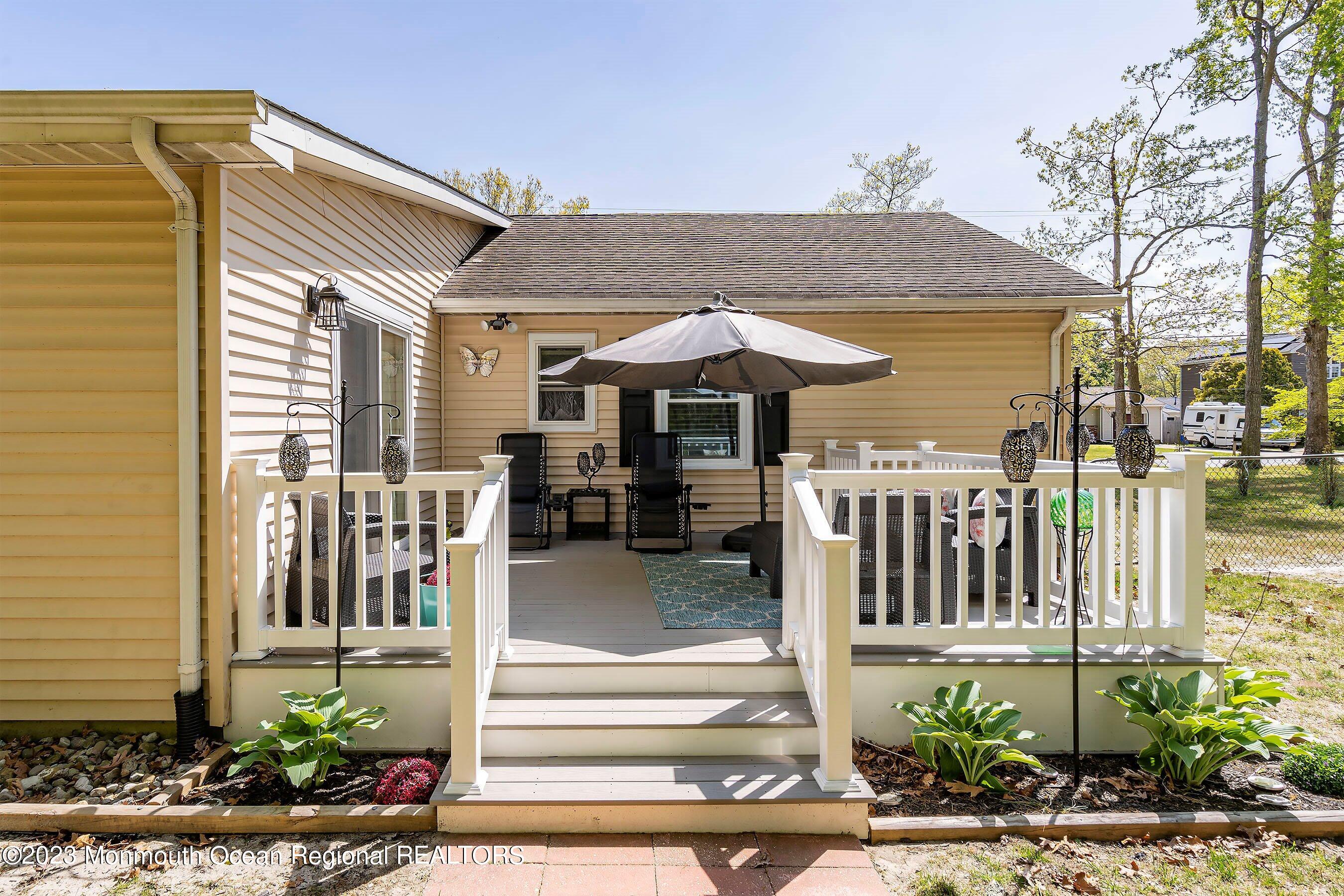 370 Constitution Drive Forked River, NJ 08731 - Photo 22 of 25 a view of a house with a porch