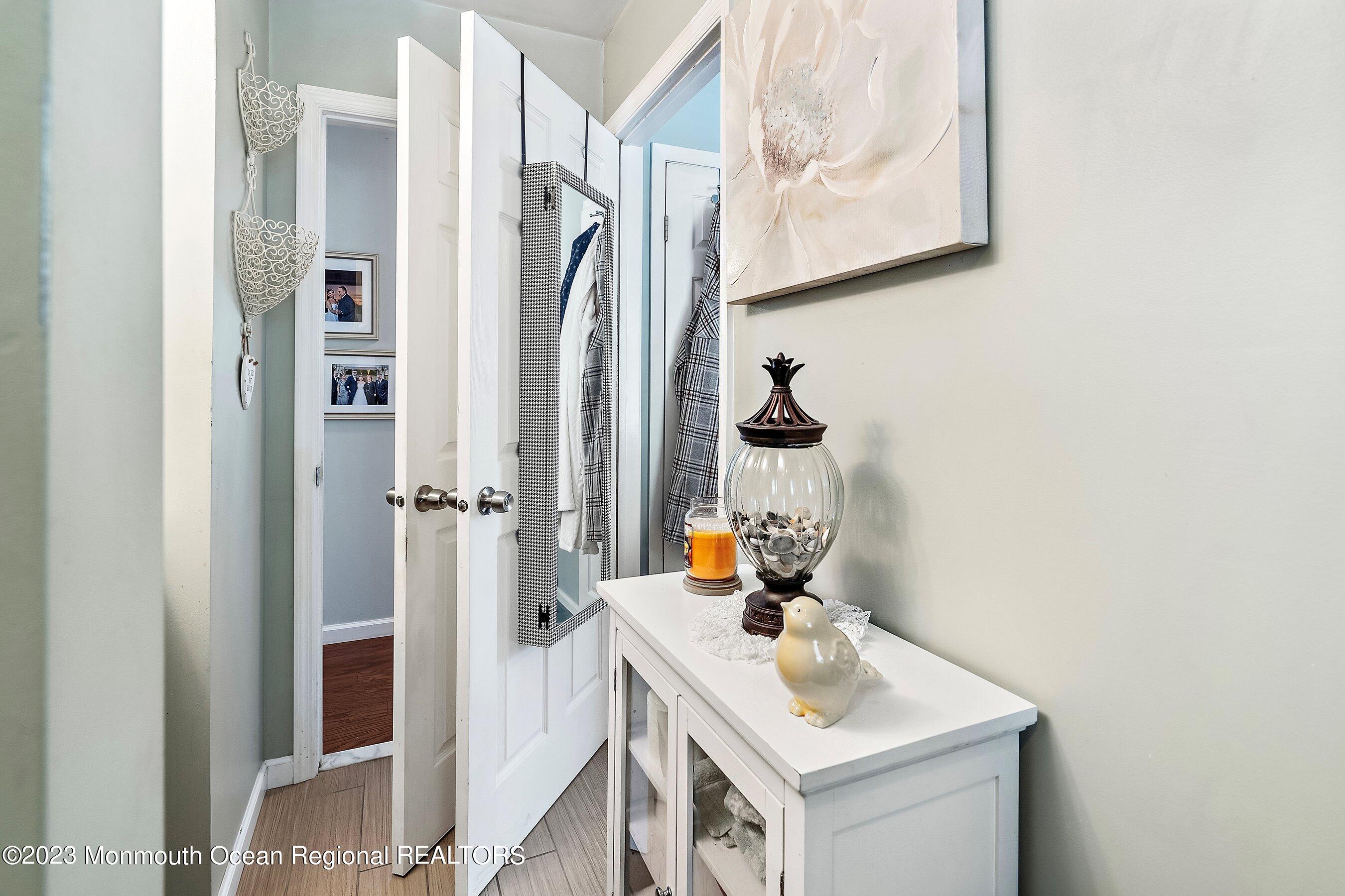 370 Constitution Drive Forked River, NJ 08731 - Photo 24 of 25 a bathroom with a sink vanity and a mirror