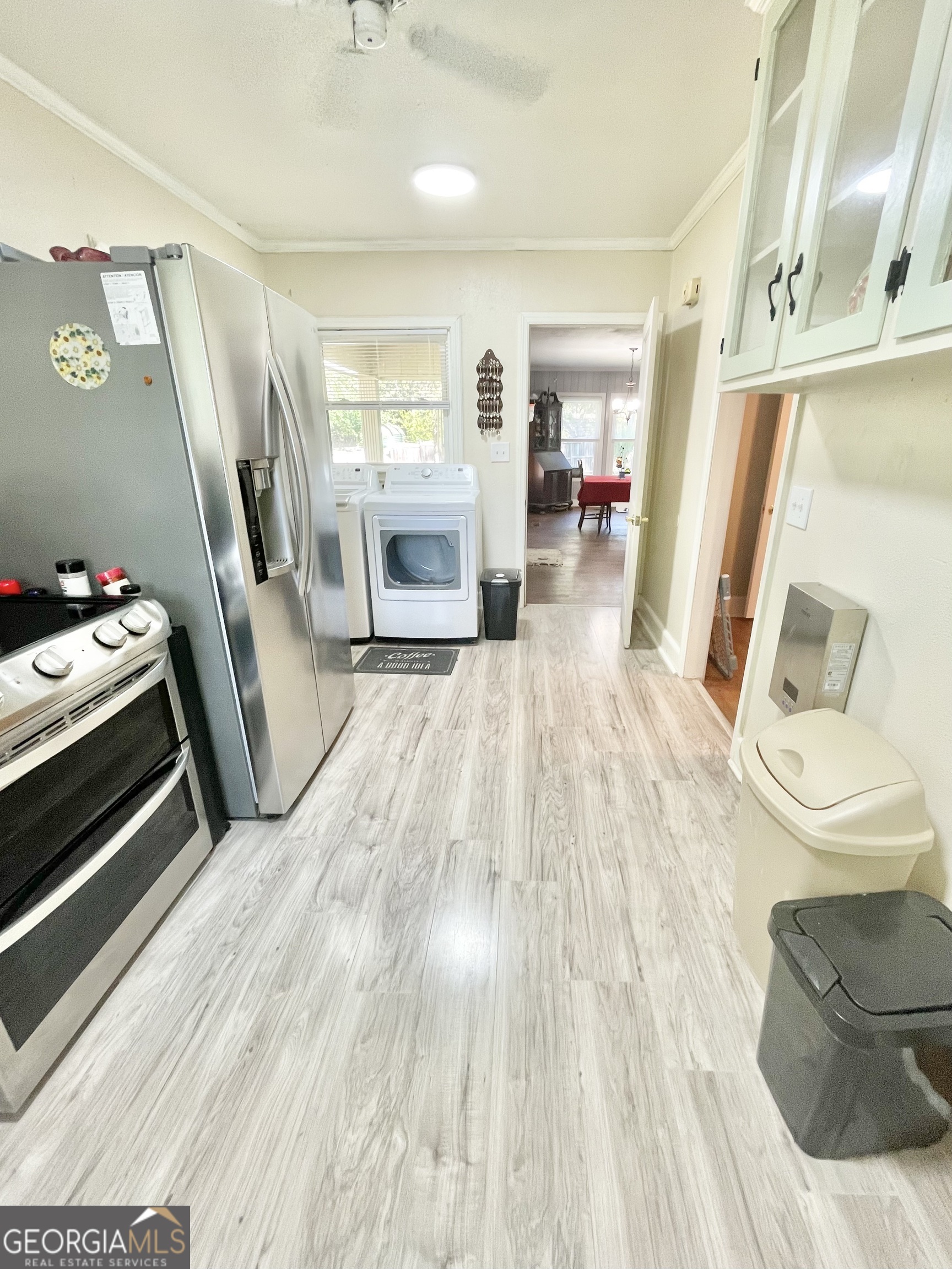 883 4th Avenue Rochelle, GA 31079 - Photo 14 of 34 a room with wooden floor and furniture