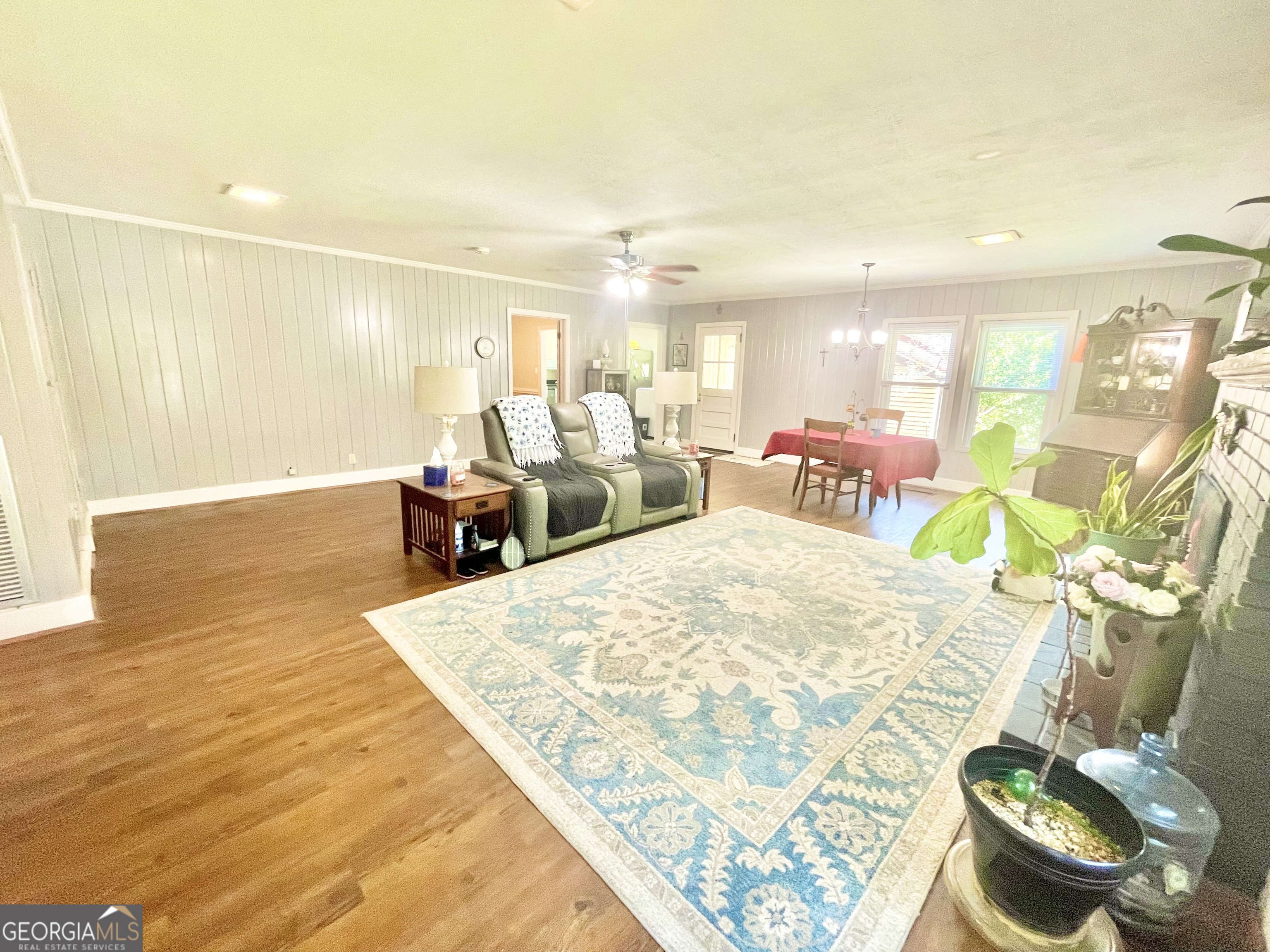 883 4th Avenue Rochelle, GA 31079 - Photo 9 of 34 a living room with furniture and a table