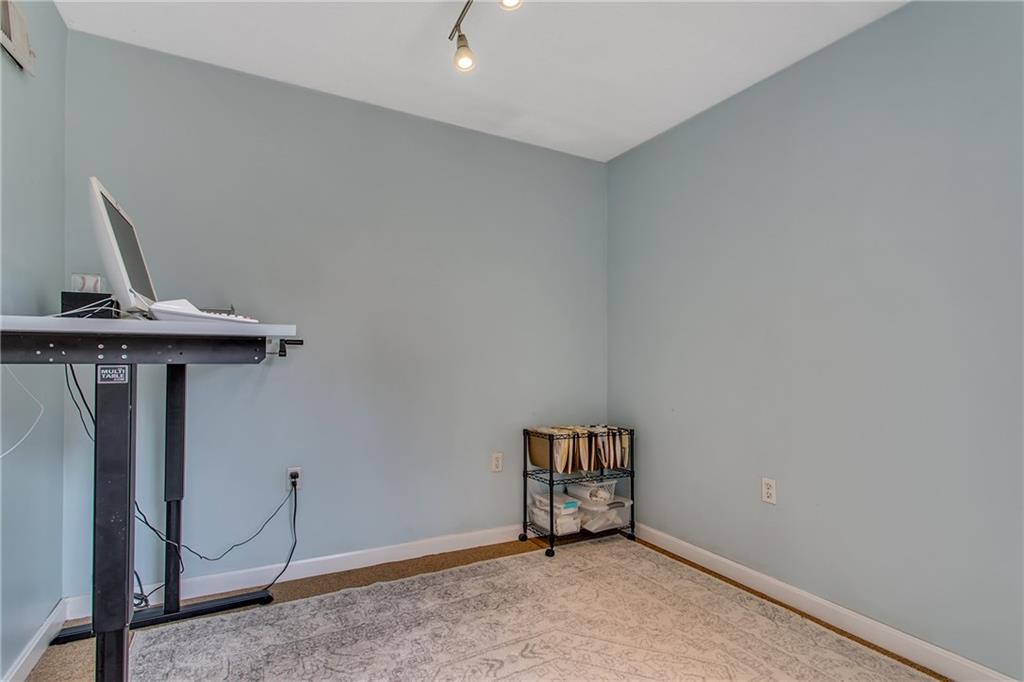 705 Filbert Street Pittsburgh, PA 15232 - Photo 15 of 25 The den is painted a relaxing shade of soft blue.