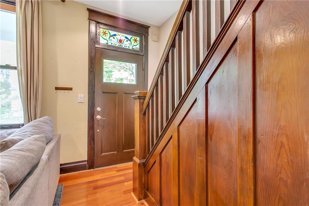 705 Filbert Street Pittsburgh, PA 15232 - Photo 4 of 25 Beautiful woodwork and newer hard wood floors in the entry and living room.
