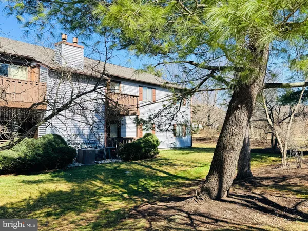 a view of a houses with yard